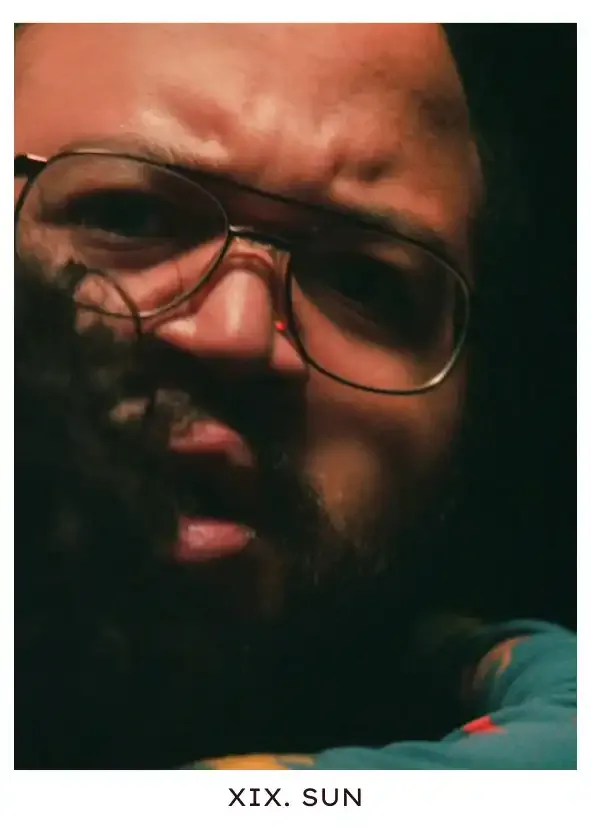 Sun: Innie Dylan is being hugged by his son in the outside world after Milchick triggers the Overtime contingency for the first time. Dylan is shocked at the knowledge that overrides are possible at all, and basking in his son's affection, family he didn't know he had until those twenty seconds that would make all known perks seem meaningless.